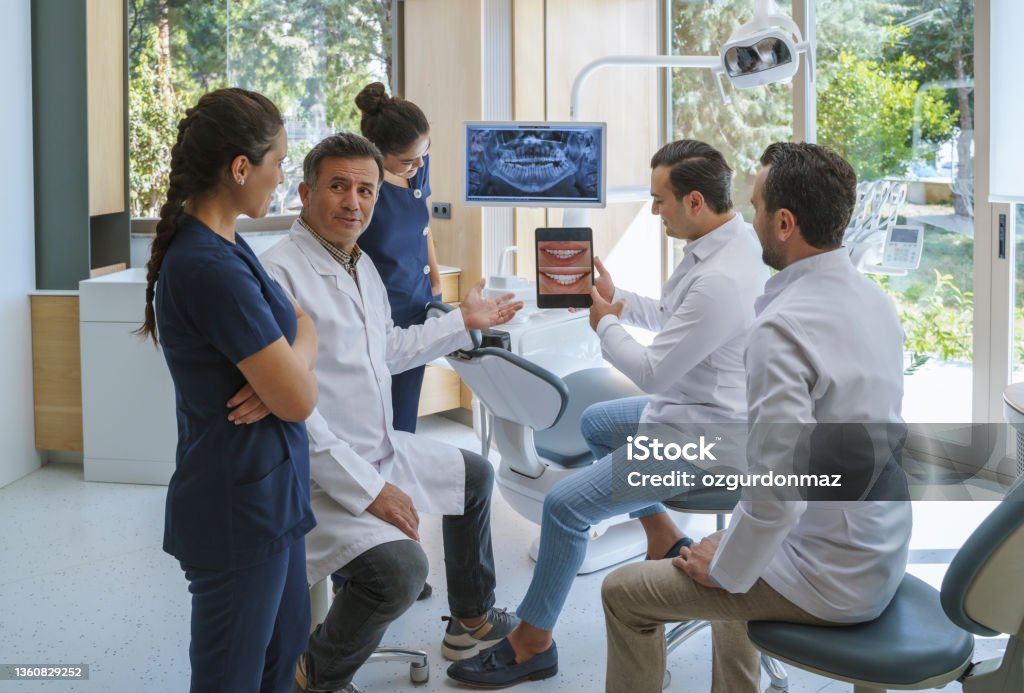 Medical dentist team working in the dental clinic